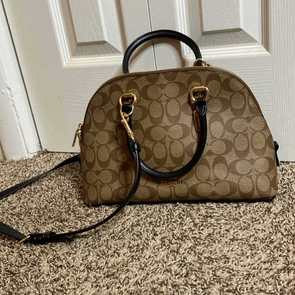 Gently used like new Coach Katy.